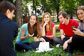 group of students socializing outdoors